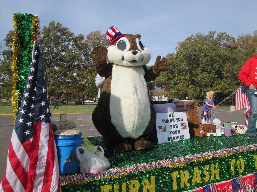 DESIGNED BY THE WEAKLEY COUNTY GIRL SCOUTS, THIS FLOAT WAS MADE UP ENTIRELY FROM RECYCLED ITEMS. THE NEW MASCOT FOR WEAKLEY COUNTY SOLID WASTE IS 
